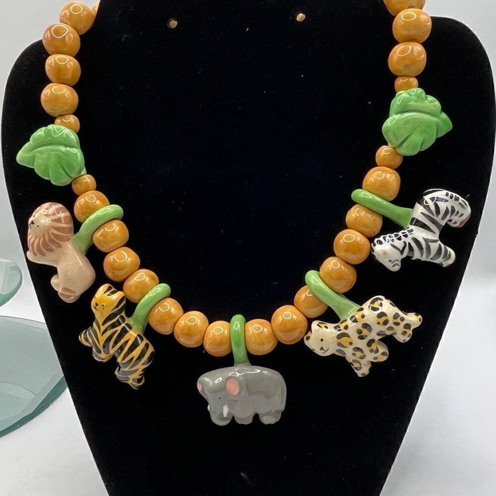 VTG Flying Colors, safari animals ceramic necklace.